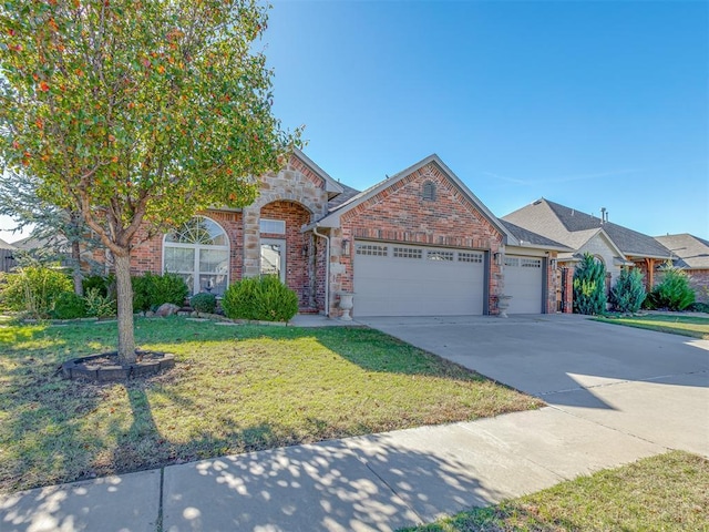 front facade featuring a front yard and a garage