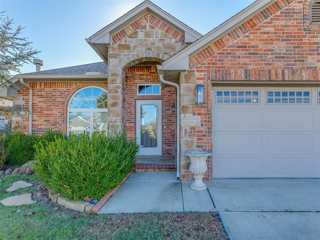 entrance to property with a garage