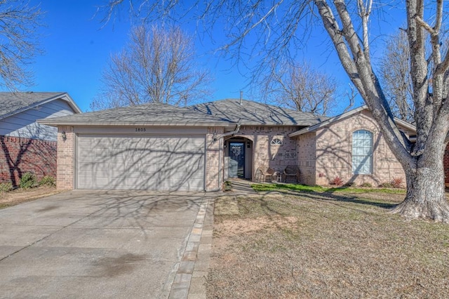 single story home featuring a front yard and a garage