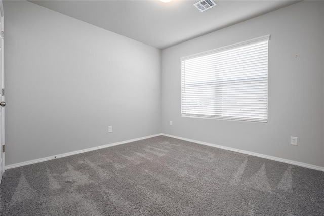 empty room featuring carpet flooring