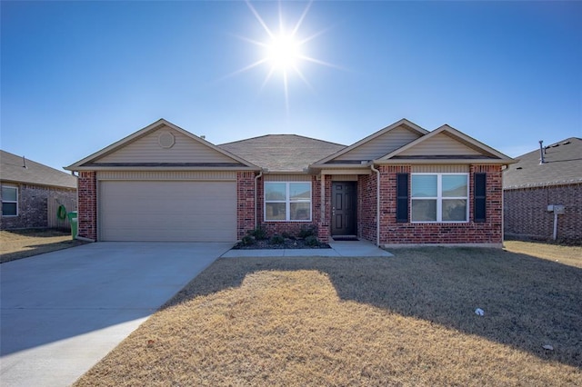 ranch-style home featuring a garage and a front lawn