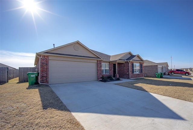 ranch-style house featuring a garage