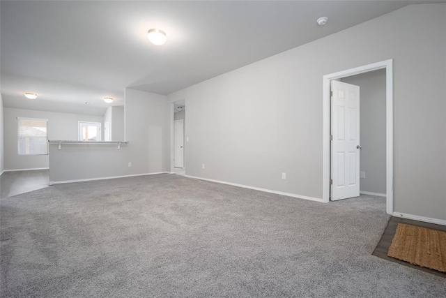 unfurnished living room with carpet floors