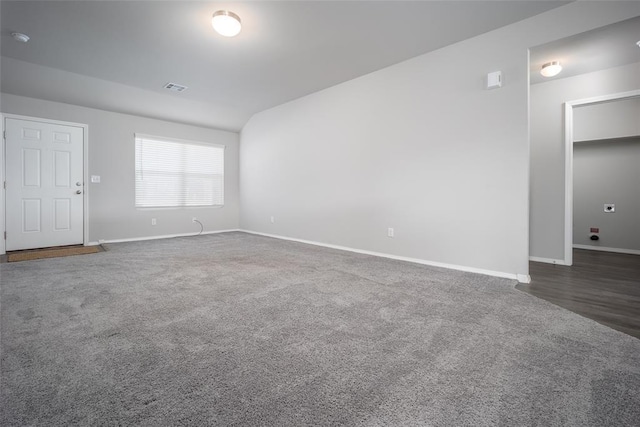 empty room with dark wood-type flooring