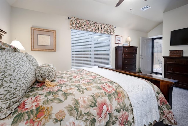 bedroom featuring carpet floors, ceiling fan, and lofted ceiling