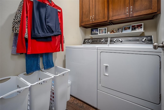 laundry area with washing machine and dryer