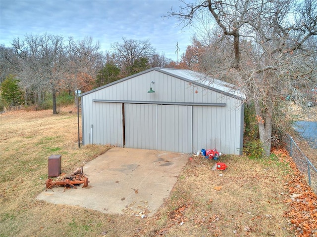 view of outdoor structure with a lawn