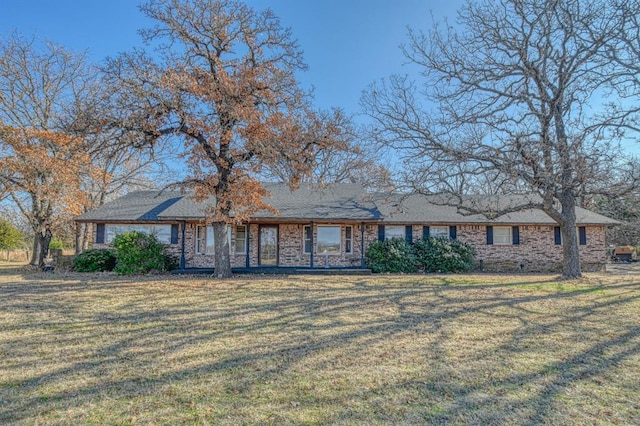 ranch-style house with a front yard