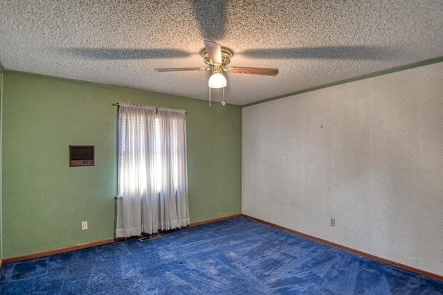 empty room featuring a textured ceiling and ornamental molding