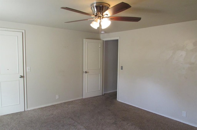 carpeted empty room with ceiling fan