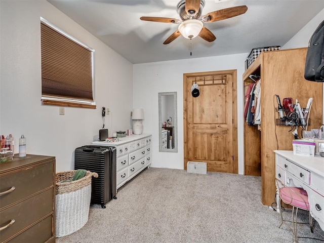 carpeted bedroom with ceiling fan