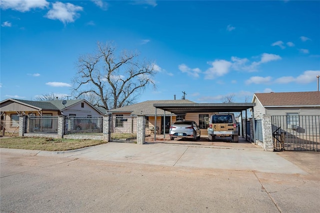 view of front of home with a carport