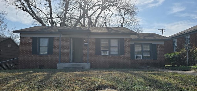 bungalow with a front lawn