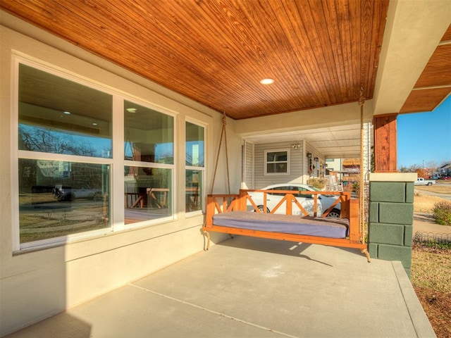 view of patio featuring a porch