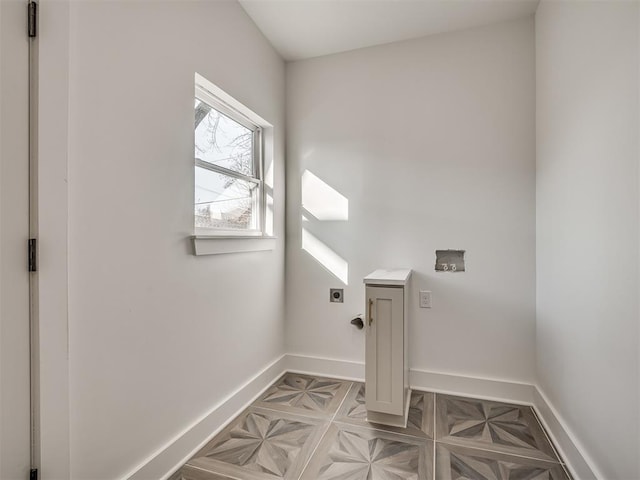 washroom featuring hookup for an electric dryer and hookup for a washing machine