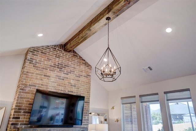 room details featuring beam ceiling and a chandelier