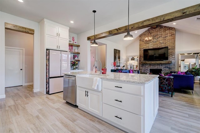 kitchen with white cabinetry, dishwasher, an island with sink, and pendant lighting