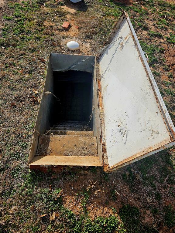 view of entry to storm shelter