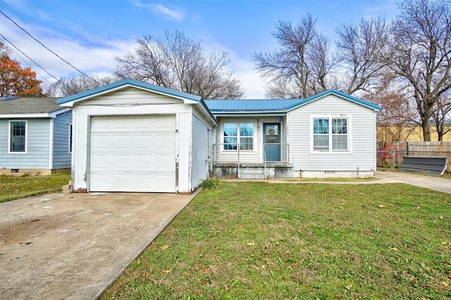 single story home featuring a front yard and a garage