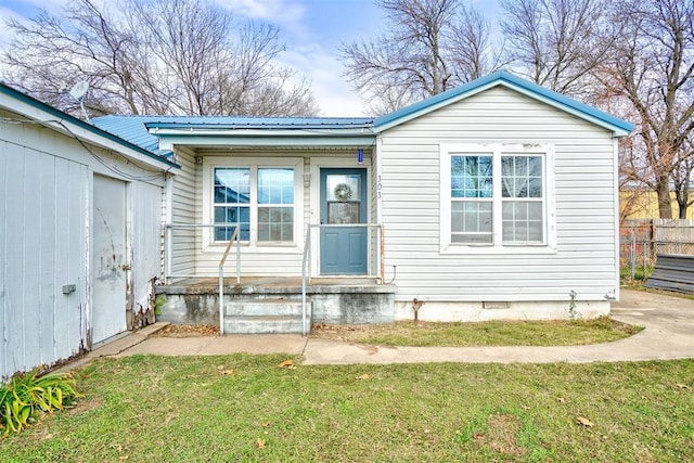 exterior space with a front lawn