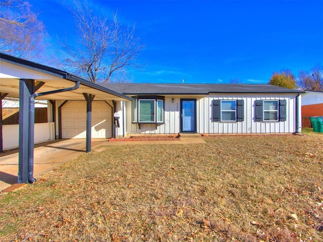 ranch-style house with a carport and a garage