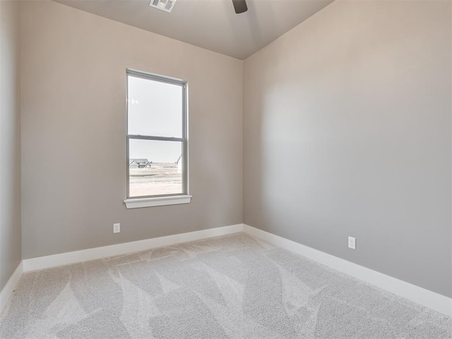 carpeted empty room with ceiling fan