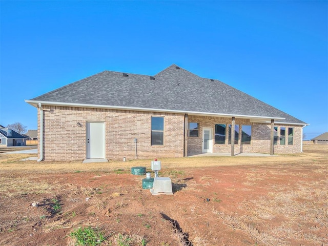 rear view of house with a patio