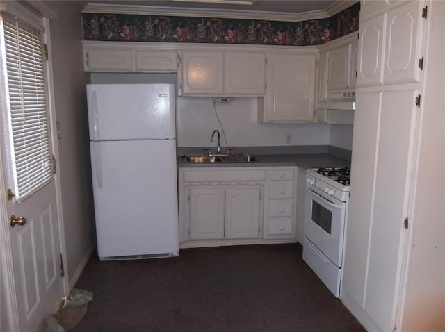 kitchen with ornamental molding, white appliances, sink, white cabinets, and range hood