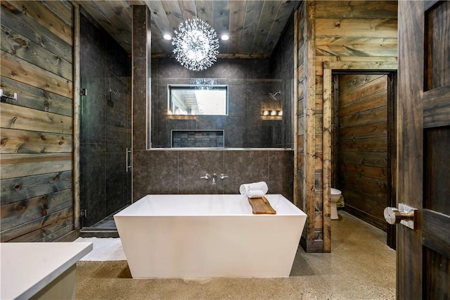 full bathroom with wooden ceiling, separate shower and tub, toilet, wooden walls, and vanity