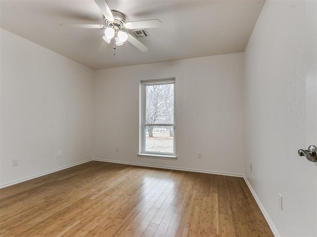 unfurnished room featuring light hardwood / wood-style flooring and ceiling fan