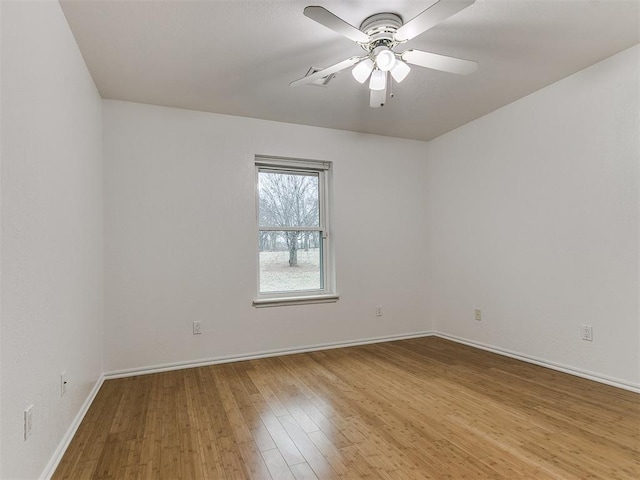 unfurnished room featuring ceiling fan and light hardwood / wood-style floors