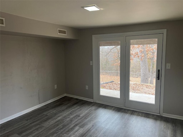 entryway with dark wood-type flooring