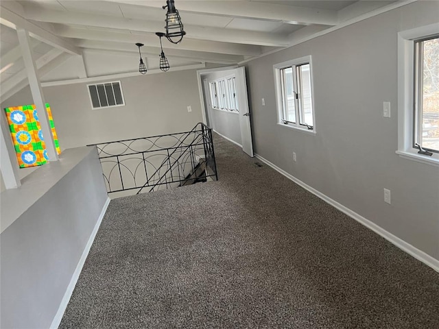 interior space with vaulted ceiling with beams and carpet floors