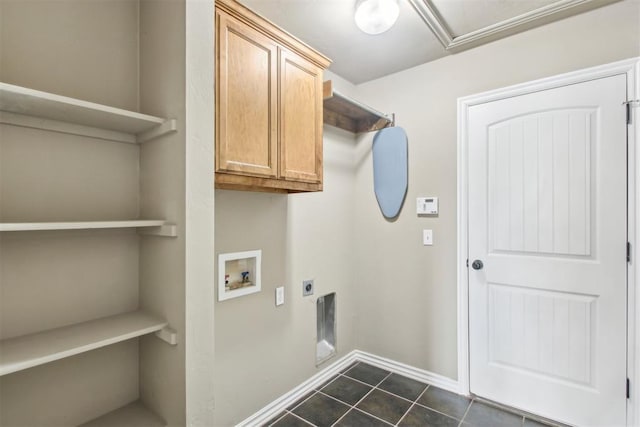 laundry room with hookup for a washing machine, dark tile patterned floors, cabinets, and hookup for an electric dryer