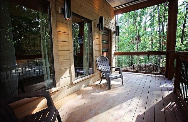 wooden deck featuring a porch