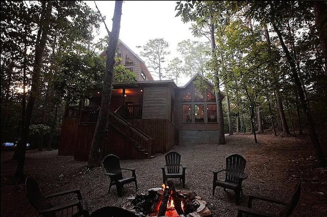 exterior space featuring a fire pit