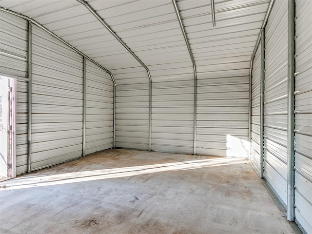 garage featuring wooden walls