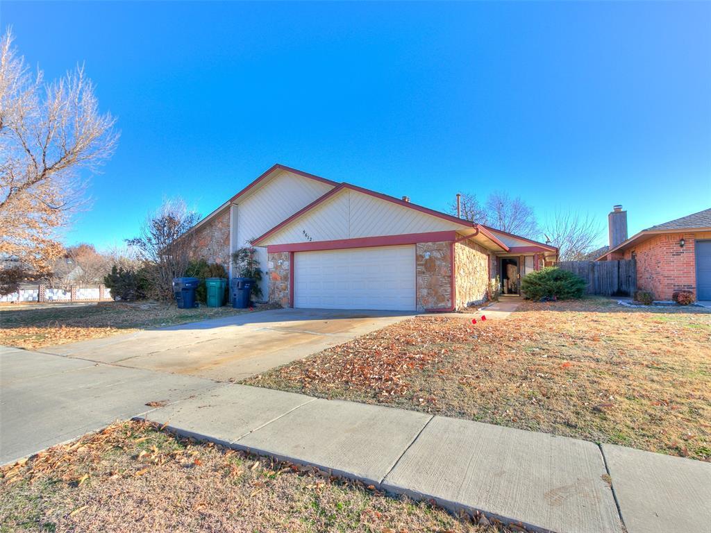 ranch-style home with a garage