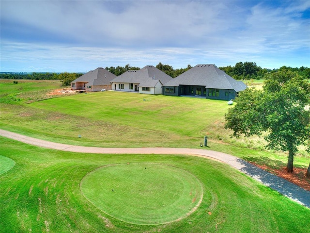 view of community featuring a lawn