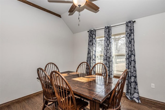 dining area with ceiling fan, plenty of natural light, hardwood / wood-style floors, and vaulted ceiling