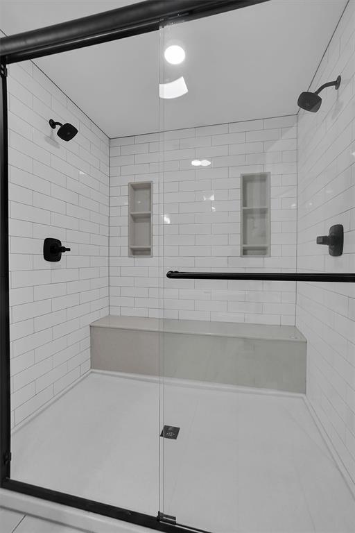 bathroom with walk in shower