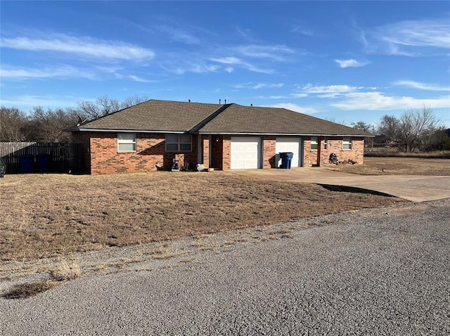 single story home featuring a garage