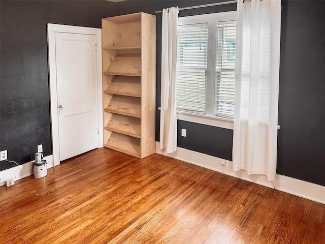 interior space with hardwood / wood-style flooring