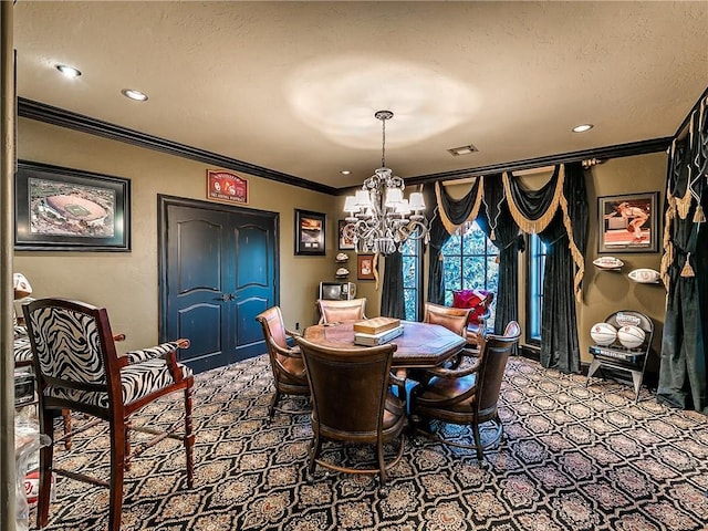 dining area featuring crown molding, carpet floors, and a chandelier