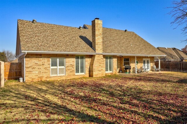 back of house featuring a patio area