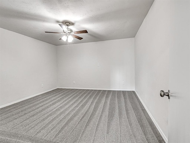 unfurnished room with a textured ceiling, carpet floors, and ceiling fan