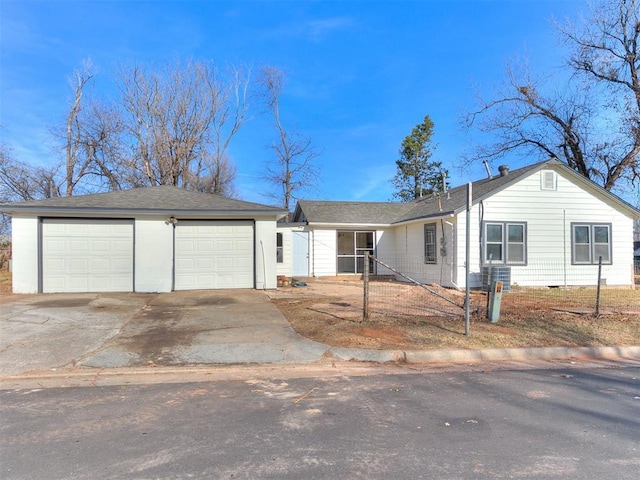 ranch-style home with a garage