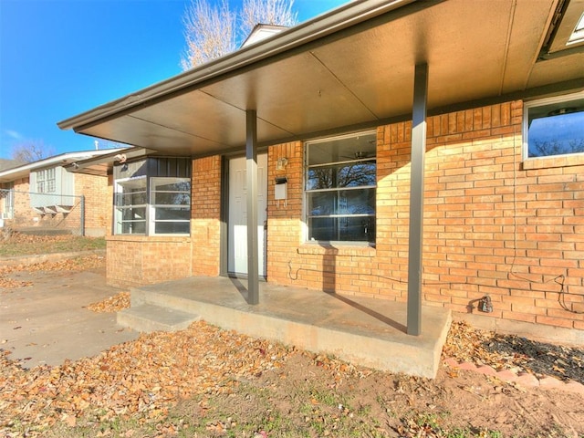 doorway to property with covered porch