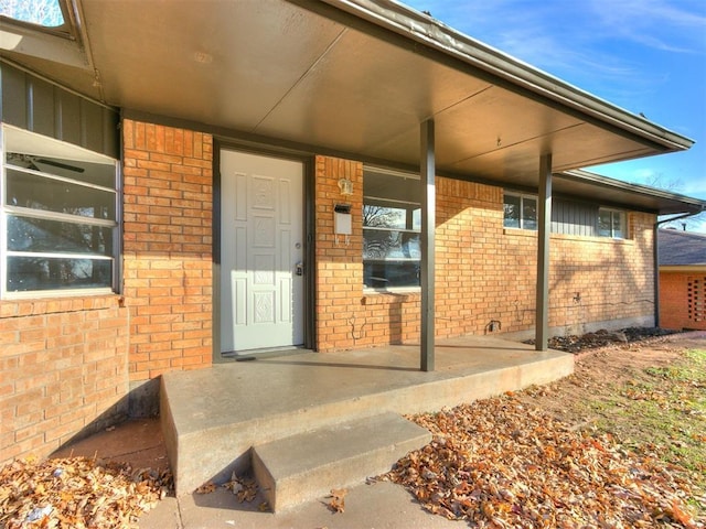 doorway to property with a porch