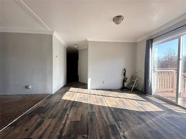 unfurnished room featuring hardwood / wood-style flooring and ornamental molding